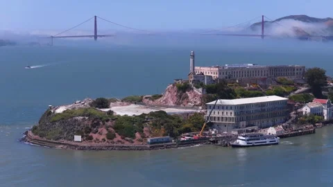 Alcatraz with Golden Gate Bridge in background Stock Footage 311328906