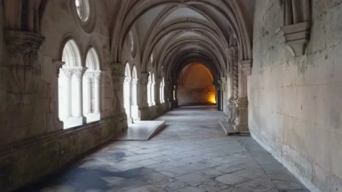 Alcobaça Monastery interior shot of a hallway with flickering light Stock Footage 167362300