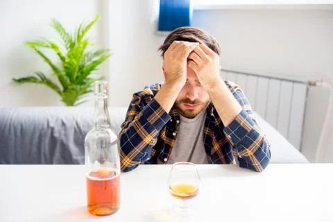 Alcohol addicted man Stock Photos
