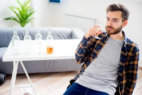 Alcohol addicted man Stock Photos