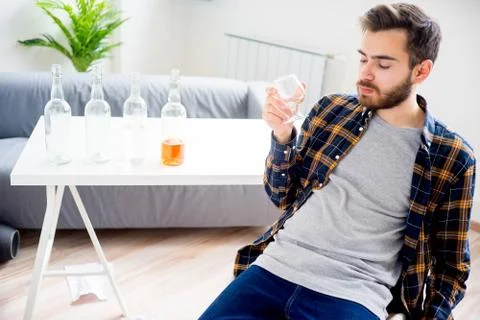 Alcohol addicted man Stock Photos