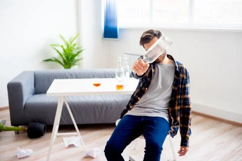 Alcohol addicted man Stock Photos