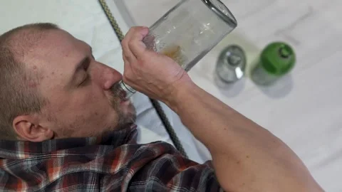 Alcohol addiction concept. The problem of drunkenness and alcoholism. Stock Footage 256025008