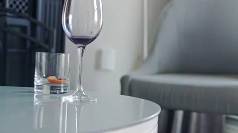 Alcohol and wine on table Video stock 183387260