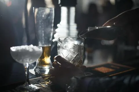 Alcohol bar, cocktail glass on bar counter, cocktail glass in a bar, Drinking Stock Photos