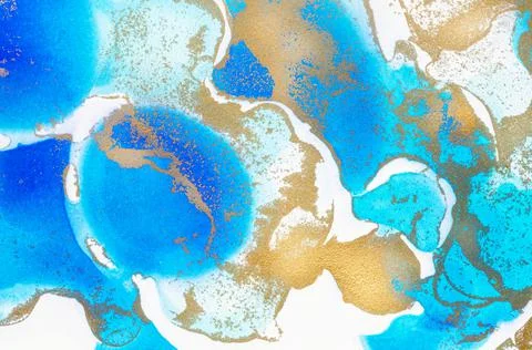Alcohol-based ink texture in blue tones with gold. Stock Photos