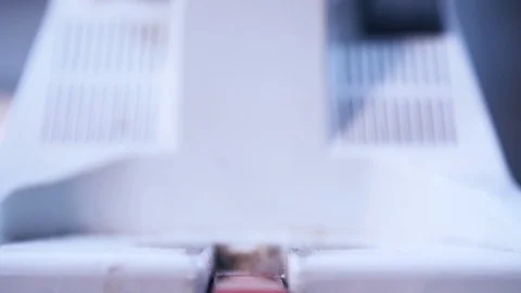 Alcohol bottle being filled by machine at distillery during bottling process Stock Footage 87120883