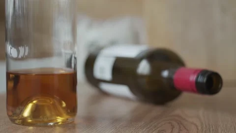 Alcohol Bottles on the Table after Drinking Party Stock Footage 172314738