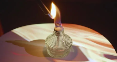 Alcohol burner wick burning. Flames projected on a table. Original atmosphere Stock Footage 153404591