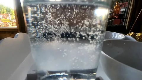 Alcohol drink bubbles slow motion Stock Footage 151636946