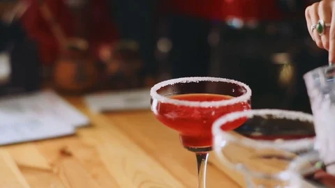 Alcohol drink cocktail glass tonic water granulated ice garnish fresh cocktail Stock Footage