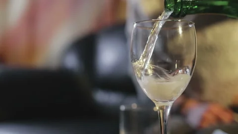 Alcohol is poured into the glass Stock Footage 87586898