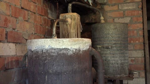 Alcohol process apparatus on fire distil... | Stock Video | Pond5