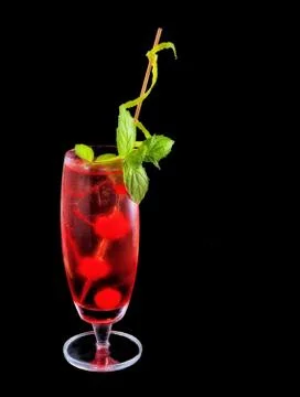 Alcohol red drink, cocktail with mint, cherry, isolated black Stock Photos
