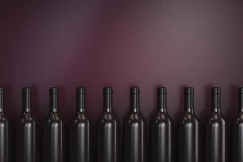 Alcohol theme background. A row of bottles of alcohol. Copy space. Foto stock