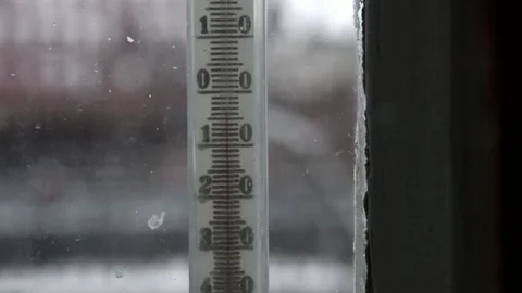 Alcohol thermometer outside the window Stock Footage 276997747
