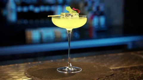 Alcoholic aromatic shots coctails serving stay on the table ready to be drinked. Video stock 239102461