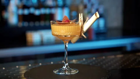 Alcoholic aromatic shots coctails serving stay on the table ready to be drinked. Video stock 239102965