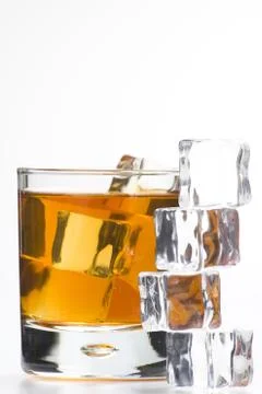 Alcoholic beverage whith ice cubes Stock Photos