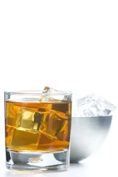 Alcoholic beverage whith ice cubes Stock Photos