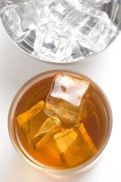 Alcoholic beverage whith ice cubes Stock Photos