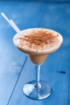 Alcoholic cocktails on blue background Stock Photos