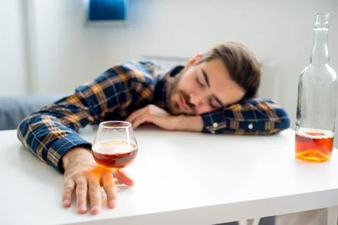 Alcoholic drunkard man Stock Photos