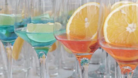Alcoholic Fruit Drinks Made from Oranges, Limes and Pineapples Video stock 241324282