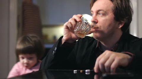 Alcoholic  Man drinking ,On the Table Pills And Alcohol Stock Footage 44759784
