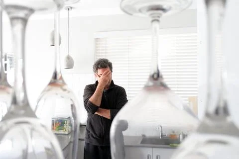 Alcoholic man trying to stop drinking alcohol Stock Photos