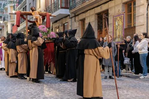 Alcoy, Spain - 2026/04/01: Religious float with Jesus on the cross Фото