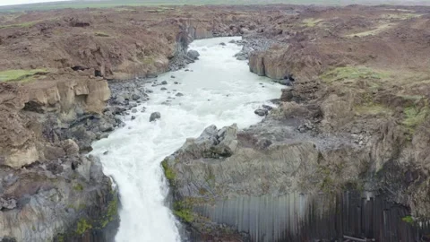 Aldeyjarfoss waterfall, drop in a powerful cold water with basalt columns Stock Footage 138709613