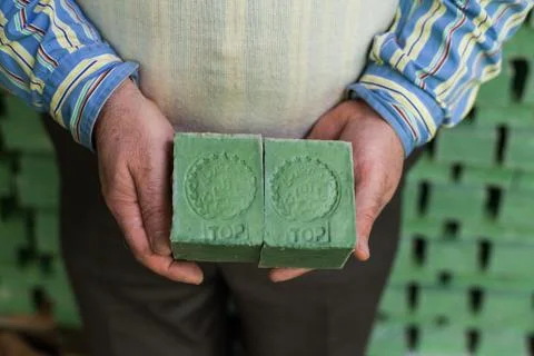 Aleppo soap in hands Stock Photos