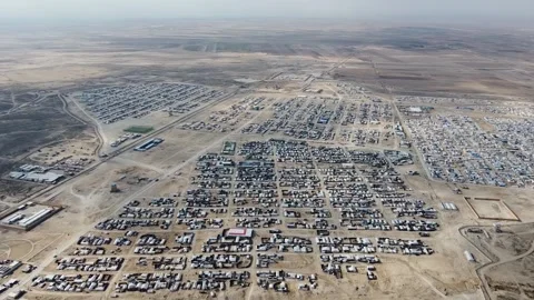 Aleppo, Syria - 01 March 2025: Aerial view of temporary shelter settlement, Stock Footage 312736862