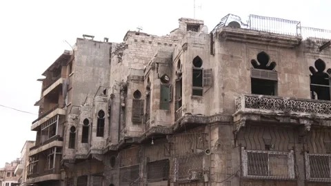 Aleppo, Syria - War-Torn Stone Building Facade and Ruins Stock Footage 333406776