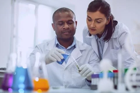 Alert scientist doing an important test Foto stock