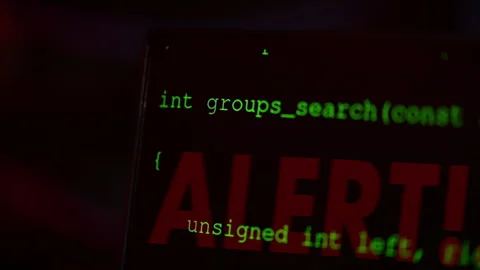 Alert signal on a computer in a server room with flashing red lights Stock Footage 287370940
