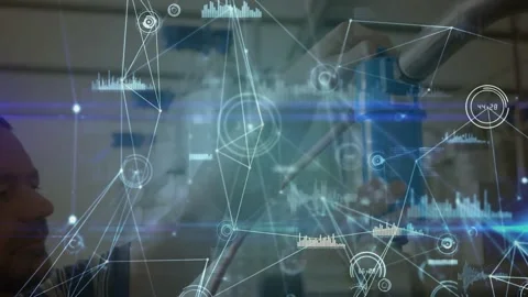 Alerting HUD animation, tech in dark shirt inspecting securing blue actuator on Stock Footage 331701462