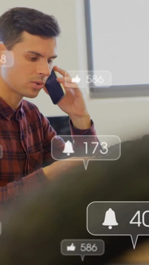 Alerts appearing man on call tapping tablet checking gear tracking likes in tech Stock Footage 334602579