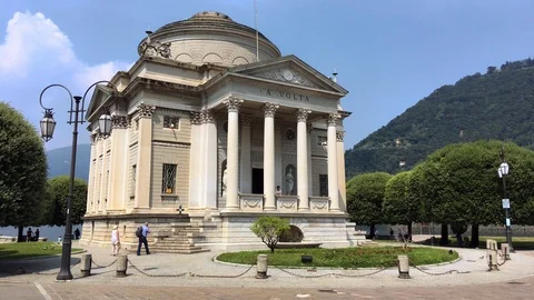 Alessandro volta temple building in como with people walking Stock Footage 118648981