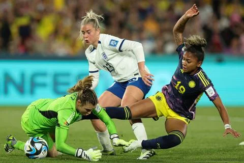  Alessia Russo of England forces an error by Catalina Perez of Colombia le... Stock Photos