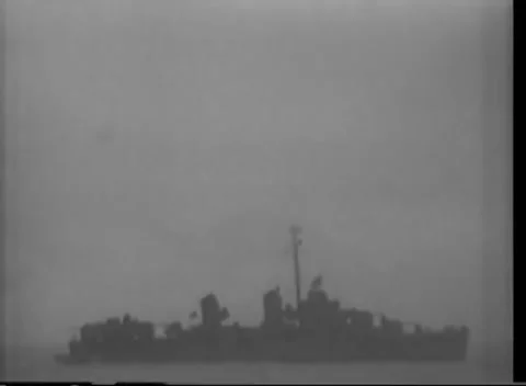 ALEUTIAN ISLANDS - 1943: Kiska task force — dark warship hull in flat light Stockbeeldmateriaal 343135518