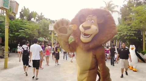 Alex the lion character is in Universal Studios Singapore Stock Footage 61414906