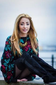 Alex sat by the Mersey Stock Photos