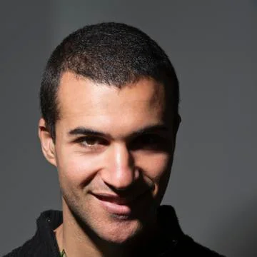 Alex - young man smiling Stock Photos