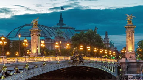 Alexandre Bridge in Paris at night in illumination day to night timelapse. Paris Stock Footage 236871523