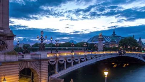 Alexandre Bridge in Paris at night in illumination day to night timelapse. Paris Stock Footage 276417691