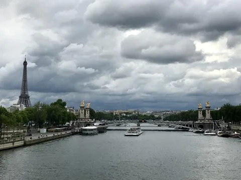 Alexandre III Bridge and Eiffel Tower over the Seine River in Paris 写真素材