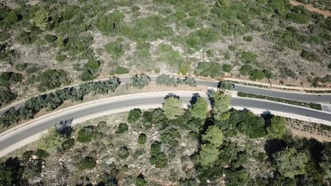 Alfa Romeo Mito on a curve mountain country road Stock Footage 110732353