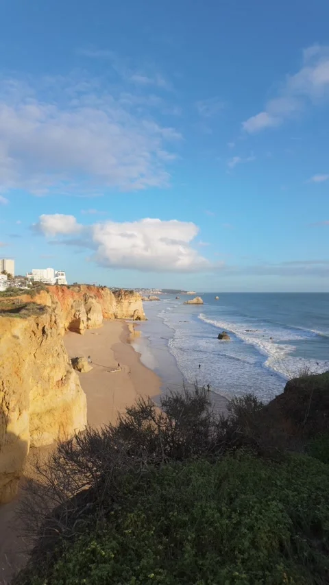Algarve coastline: Cliffs, beaches, sunset glow. Video stock 301647038